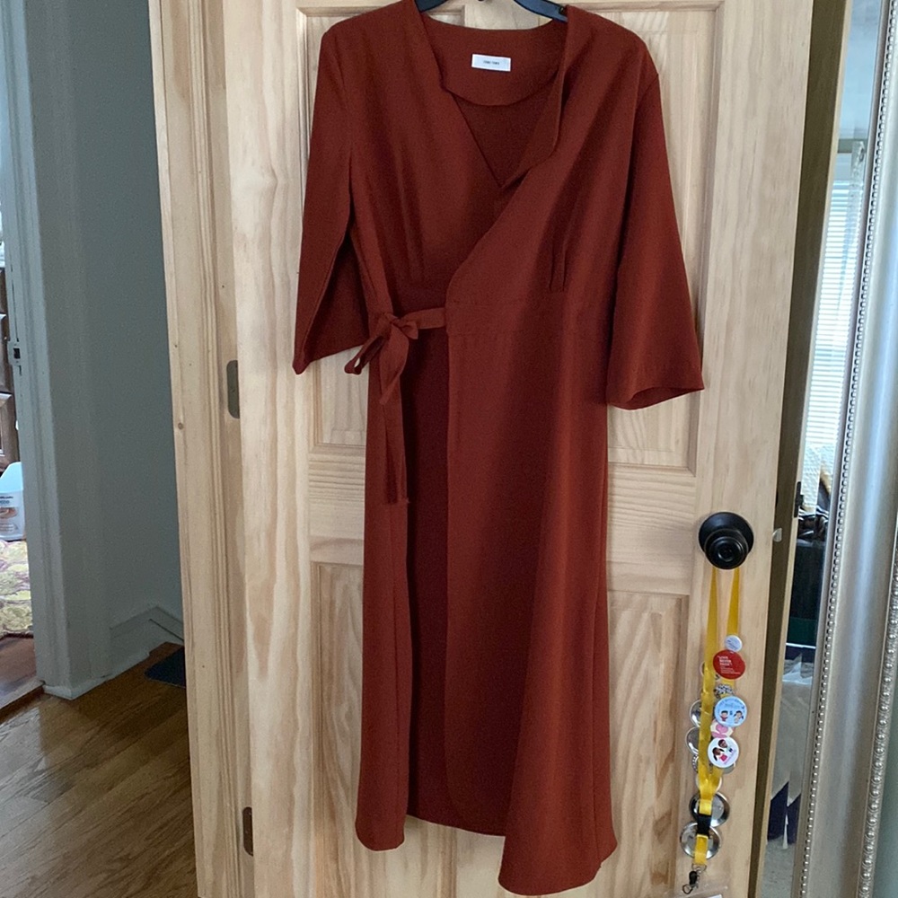 Korean style wrap dress mid calf.  Adjustable w inside buttons